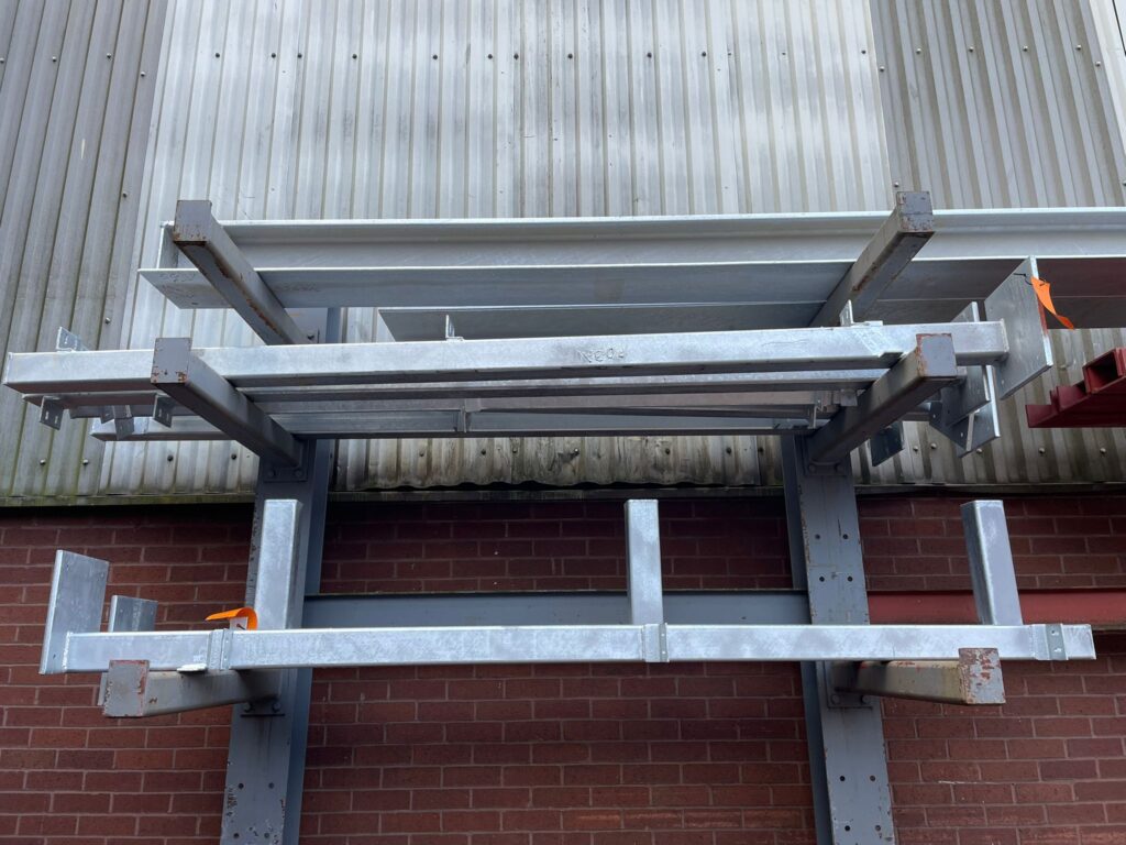 Galvanized steel beams ready for a construction project, showcasing rust resistance.